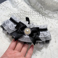 Cat bib collar with bow tie, laid flat
