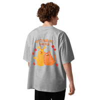Best friends forever graphic featuring a person and their dog, printed on an oversized heather t-shirt, front view