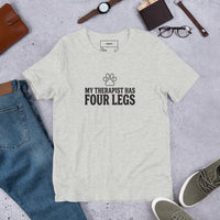 Four-legged therapist graphic featuring a dog, printed on a athletic heather t-shirt, front view