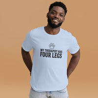 Four-legged therapist graphic featuring a dog, printed on a light t-shirt, front view