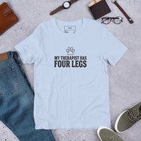 Four-legged therapist graphic featuring a dog, printed on a light t-shirt, front view