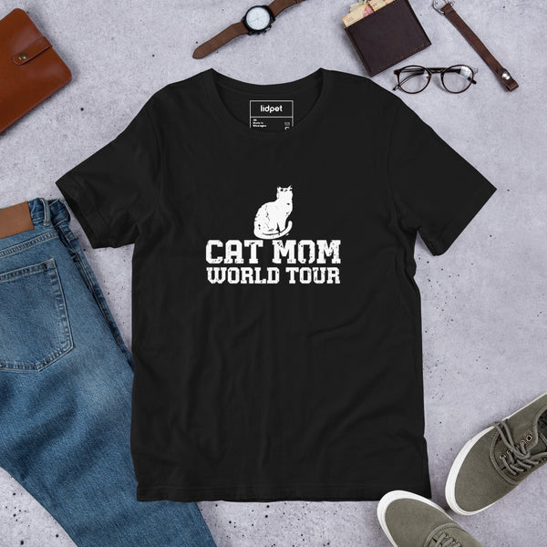 Cat mom world tour graphic featuring a cat, printed on a black t-shirt, front view