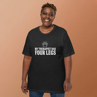 Four-legged therapist graphic featuring a dog, printed on a black t-shirt, front view