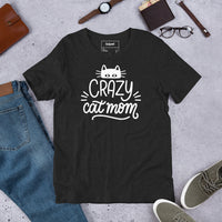Crazy cat mom graphic featuring a cat, printed on a black t-shirt, front view
