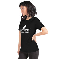 Cat mom world tour graphic featuring a cat, printed on a black t-shirt, front view