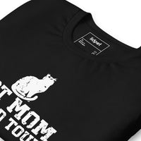 Cat mom world tour graphic featuring a cat, printed on a black t-shirt, front view