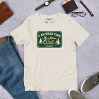 Unisex staple t-shirt showing 5 AM walk club graphic, Heather Dust, front view