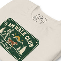 Unisex staple t-shirt showing 5 AM walk club graphic, Heather Dust, front view