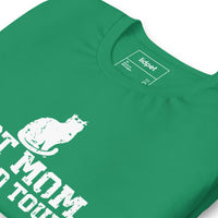 Cat mom world tour graphic featuring a cat, printed on a light t-shirt, front view