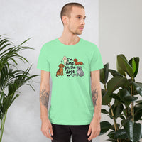 I'm here for the dogs graphic featuring dogs, printed on a light t-shirt, front view