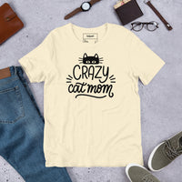 Crazy cat mom graphic featuring a cat, printed on a light t-shirt, front view