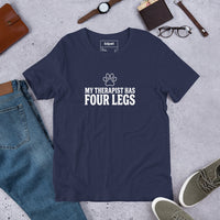 Four-legged therapist graphic featuring a dog, printed on a navy t-shirt, front view