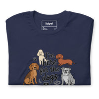 I'm here for the dogs graphic featuring dogs, printed on a navy t-shirt, front view