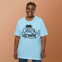 Crazy cat mom graphic featuring a cat, printed on a light t-shirt, front view