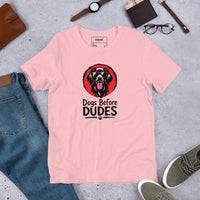 Unisex staple t-shirt showing dogs before dudes graphic, Pink, front view