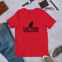 Cat mom world tour graphic featuring a cat, printed on a red t-shirt, front view