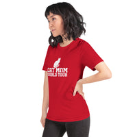 Cat mom world tour graphic featuring a cat, printed on a red t-shirt, front view