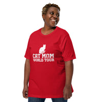 Cat mom world tour graphic featuring a cat, printed on a red t-shirt, front view