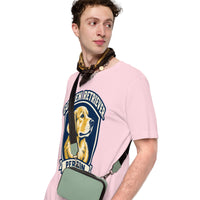 Unisex staple t-shirt showing golden retriever breed badge graphic, Soft Pink, left front view