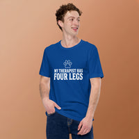 Four-legged therapist graphic featuring a dog, printed on a light t-shirt, front view