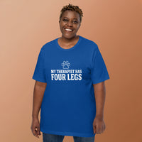Four-legged therapist graphic featuring a dog, printed on a light t-shirt, front view