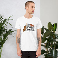 I'm here for the dogs graphic featuring dogs, printed on a white t-shirt, front view