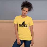 Cat mom world tour graphic featuring a cat, printed on a light t-shirt, front view